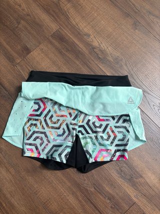 Reebok Pantalón Deportivo con Sobrefalda