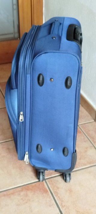 Maleta de viaje azul con 4 ruedas
