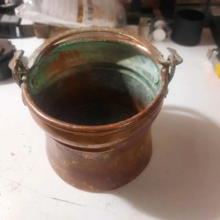 Pentola in rame con manici