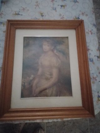 Pintura enmarcada con madera y cristal