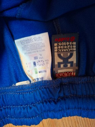Fit sportivo/vintage t-shirt Puma pantaloni Lotto