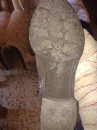 Botas altas de ante azul y piel marrón