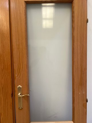 Puerta doble de roble con cristal