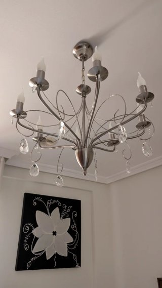Lámpara de araña de cristal y metal