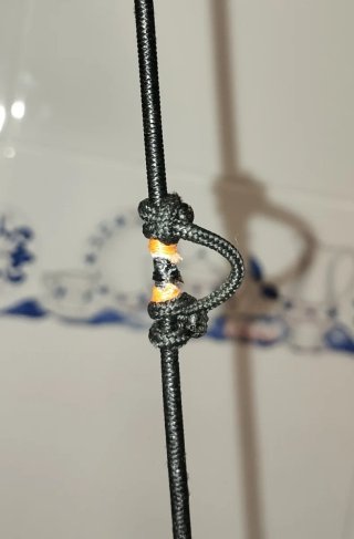 Ajustes para arco de poleas de caza.