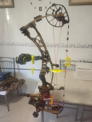 Ajustes para arco de poleas de caza.