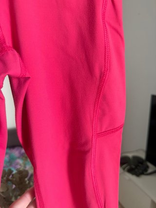 Mallas deportivas rosas con bolsillos