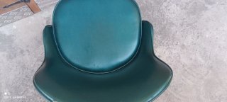 Butaca vintage verde con flecos