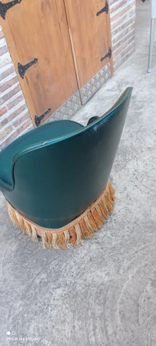 Butaca vintage verde con flecos