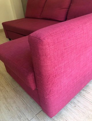 Sofá cama rosa/rojo de tela