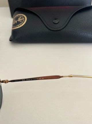 Occhiali da sole Ray-Ban RB3768 neri e oro