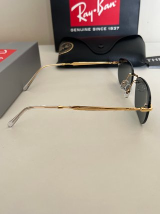 Occhiali da sole Ray-Ban RB3768 neri e oro