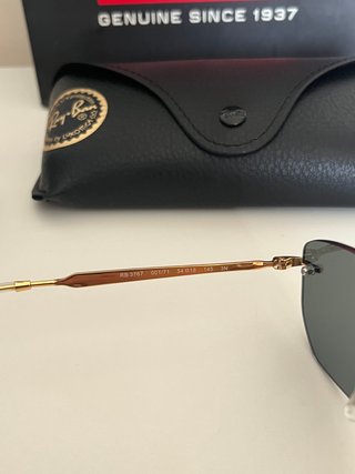 Occhiali da sole Ray-Ban RB3768 neri e oro