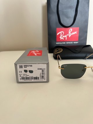 Occhiali da sole Ray-Ban RB3768 neri e oro