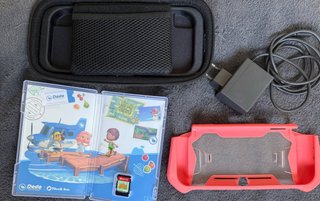 Nintendo Switch Lite coral + Accessori