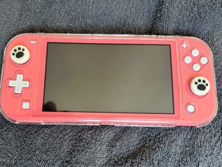 Nintendo Switch Lite coral + Accessori