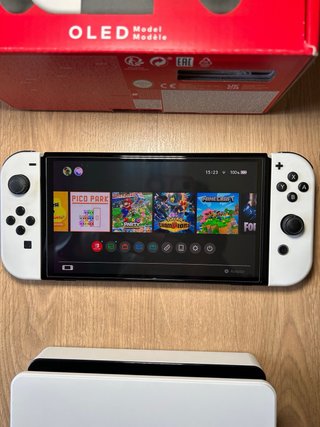 Nintendo Switch OLED Blanca y Negra + Animal Cross