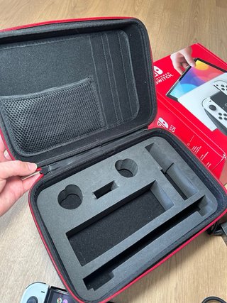 Nintendo Switch OLED Blanca y Negra + Animal Cross