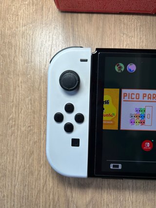 Nintendo Switch OLED Blanca y Negra + Animal Cross