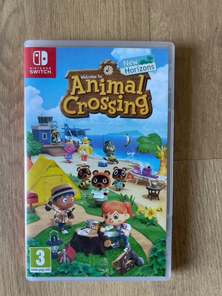 Nintendo Switch OLED Blanca y Negra + Animal Cross