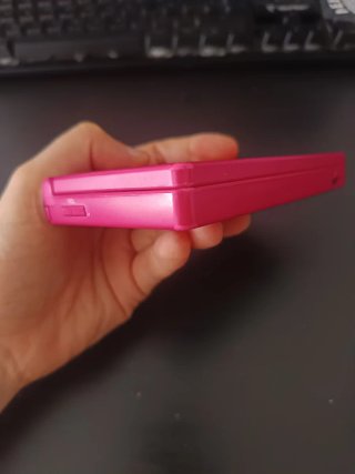 Nintendo DSi Rosa con 7 juegos y cargador