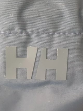 Chubasquero Helly Hansen azul marino mujer