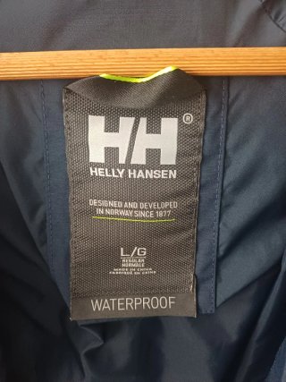 Chubasquero Helly Hansen azul marino mujer