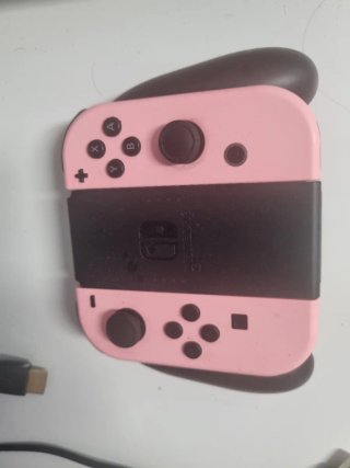 Nintendo Switch OLED con accesorios