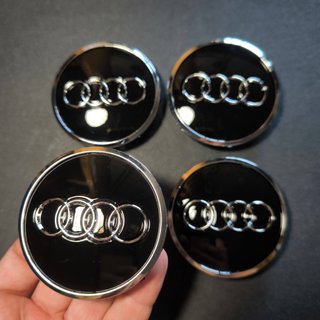 TAPABUJES AUDI 61mm NEGRO - EMBLEMA LLANTAS AUDI