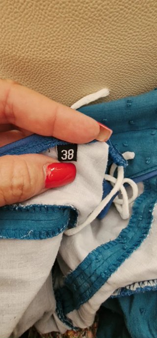 Traje de flamenca azul con volantes