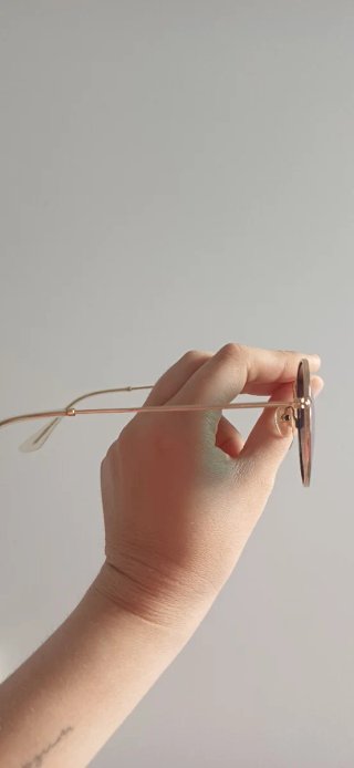 Gafas de sol Meller doradas y con cristal rosa