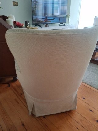 Sillón de tela beige
