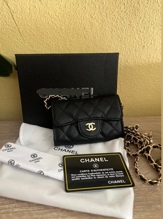 Mini borsa Chanel nera e dorata