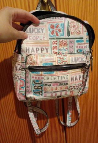 Mochila Parfois multicolor con estampado
