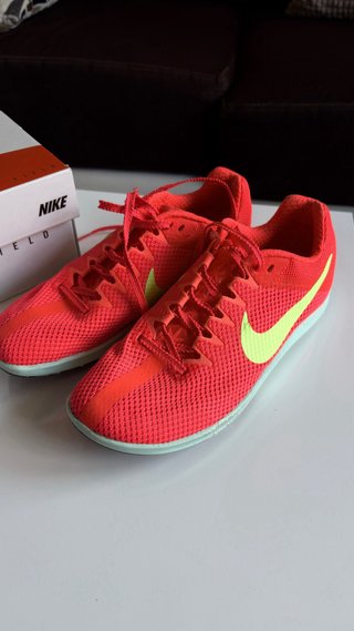 Zapatillas clavos Nike running rojas y verdes