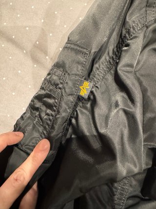 Chaqueta Alpha Industries MA1 Negra Naranja