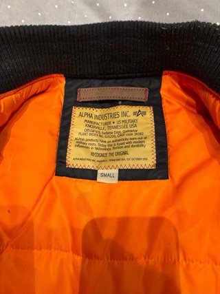 Chaqueta Alpha Industries MA1 Negra Naranja