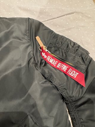 Chaqueta Alpha Industries MA1 Negra Naranja