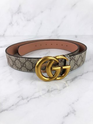 Cinturone Gucci GG Supreme con fibbia dorata