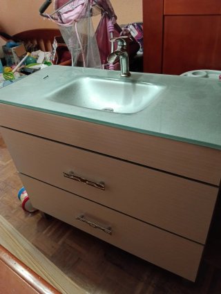 Mueble de baño con lavabo de cristal