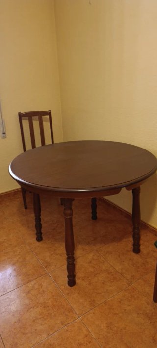 Mesa redonda de madera marrón 1m