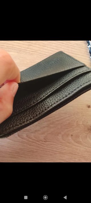 Bolso y tarjetero negro con alas