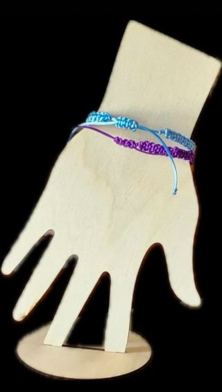 Pulseras tejidas con cruz "buenas vibras"