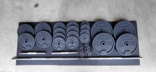 Set de musculación: banco, rack, pesas y suelo