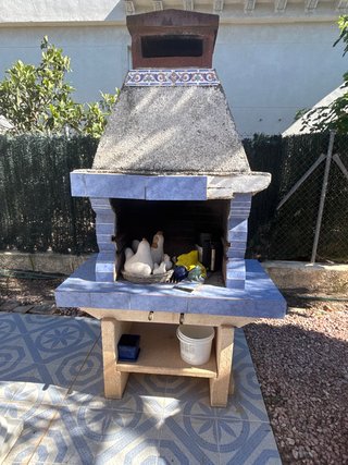 Barbacoa de obra azul y gris