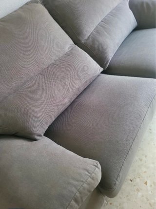 Sofá y sillón de tela gris