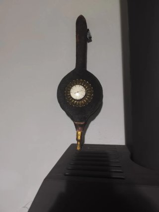 Sopla chimenea con reloj
