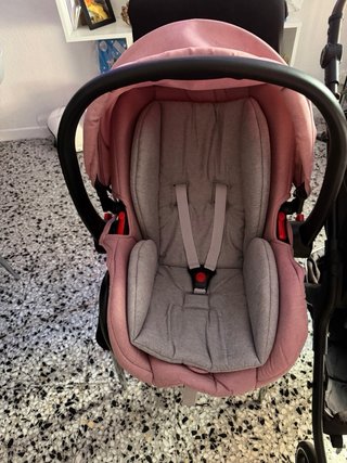 Cochecito de bebé negro y rosa