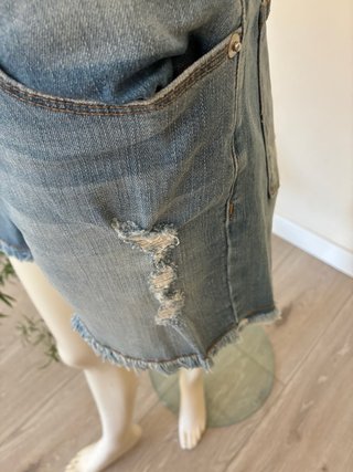 Top rosa y shorts vaqueros Pedro del Hierro