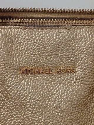 Bolso Michael Kors Dorado Costó 325€